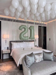 Ceiling Balloon Setup with Number Balloons | White & Sage Green